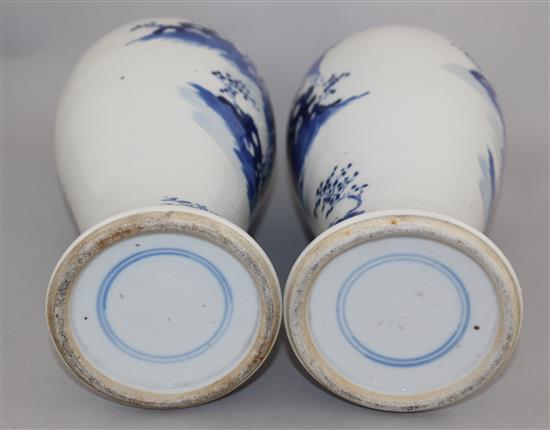 Two Chinese blue and white baluster vases and a cover, late 19th century, 28cm